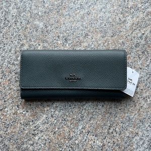 Coach, soft tri fold wallet in gray. Brand new, never used, with tag.